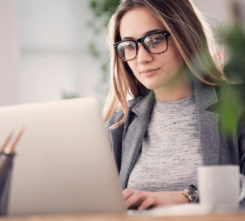 Lady working on a laptop from home