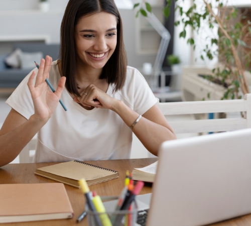 Happy employee working from home videoconferencing