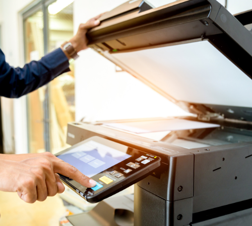 man using printer 