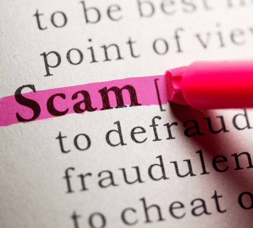 Highlighting the word scam in a book