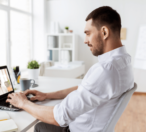 Man at his desk on a videoconference